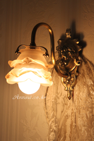 antique frenchcherub wall lamp